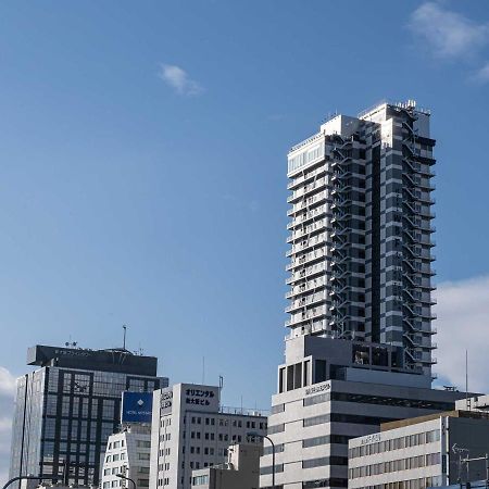 Hotel Wbf Shin-Osaka Skytower Bagian luar foto