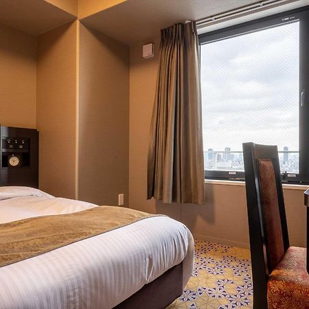 Hotel Wbf Shin-Osaka Skytower Bagian luar foto