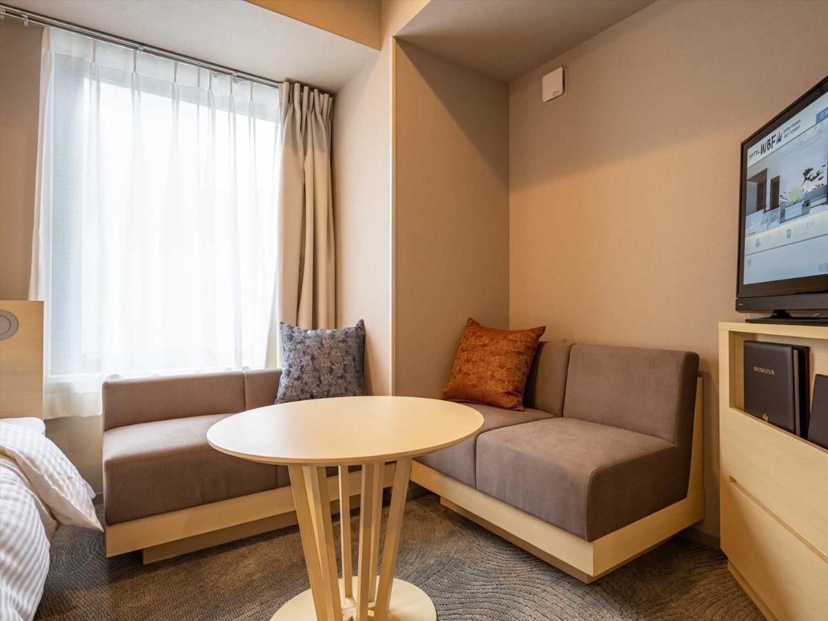 Hotel Wbf Shin-Osaka Skytower Bagian luar foto