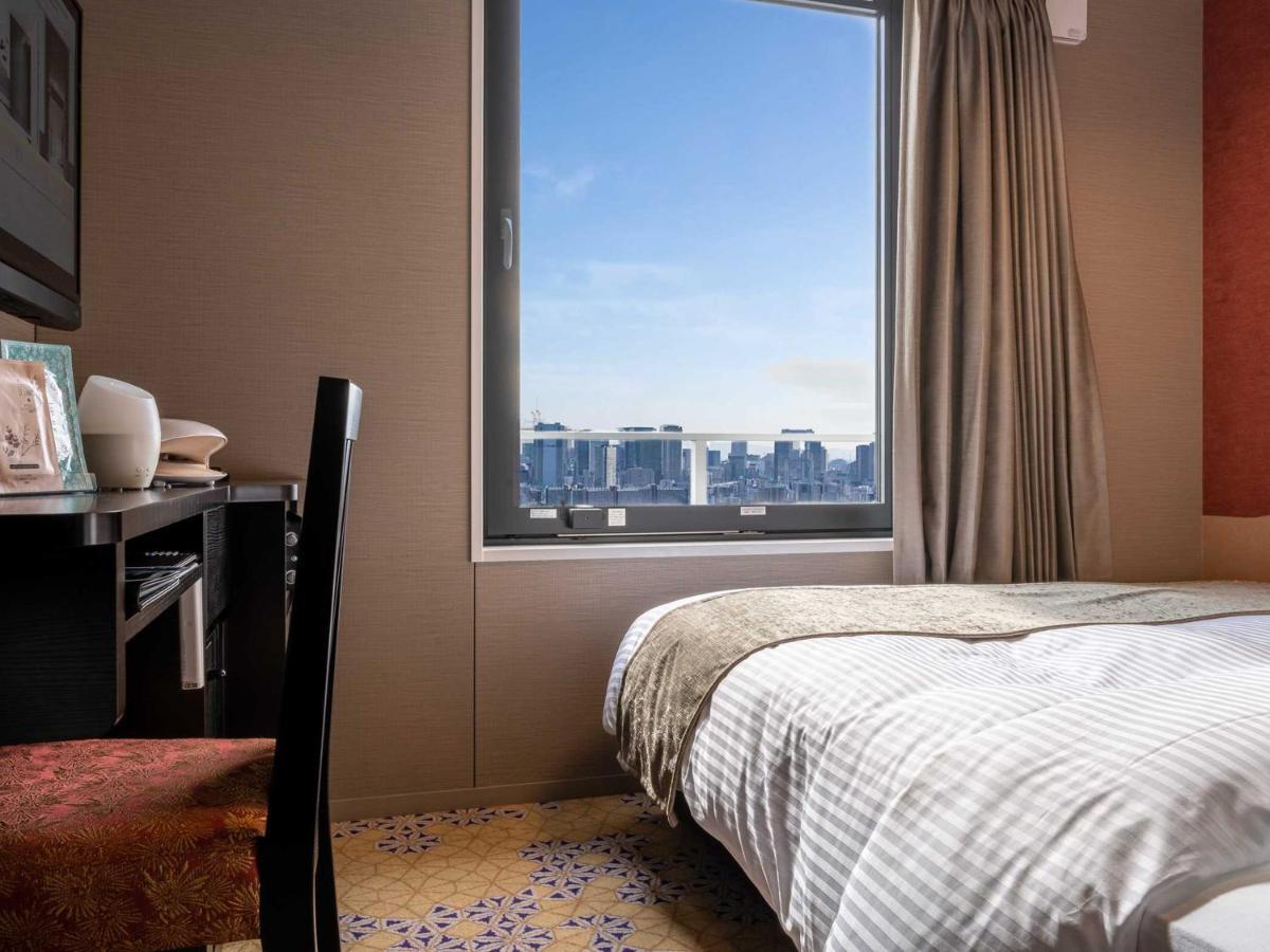 Hotel Wbf Shin-Osaka Skytower Bagian luar foto