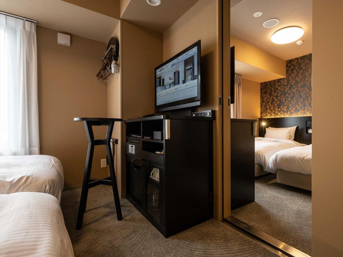 Hotel Wbf Shin-Osaka Skytower Bagian luar foto