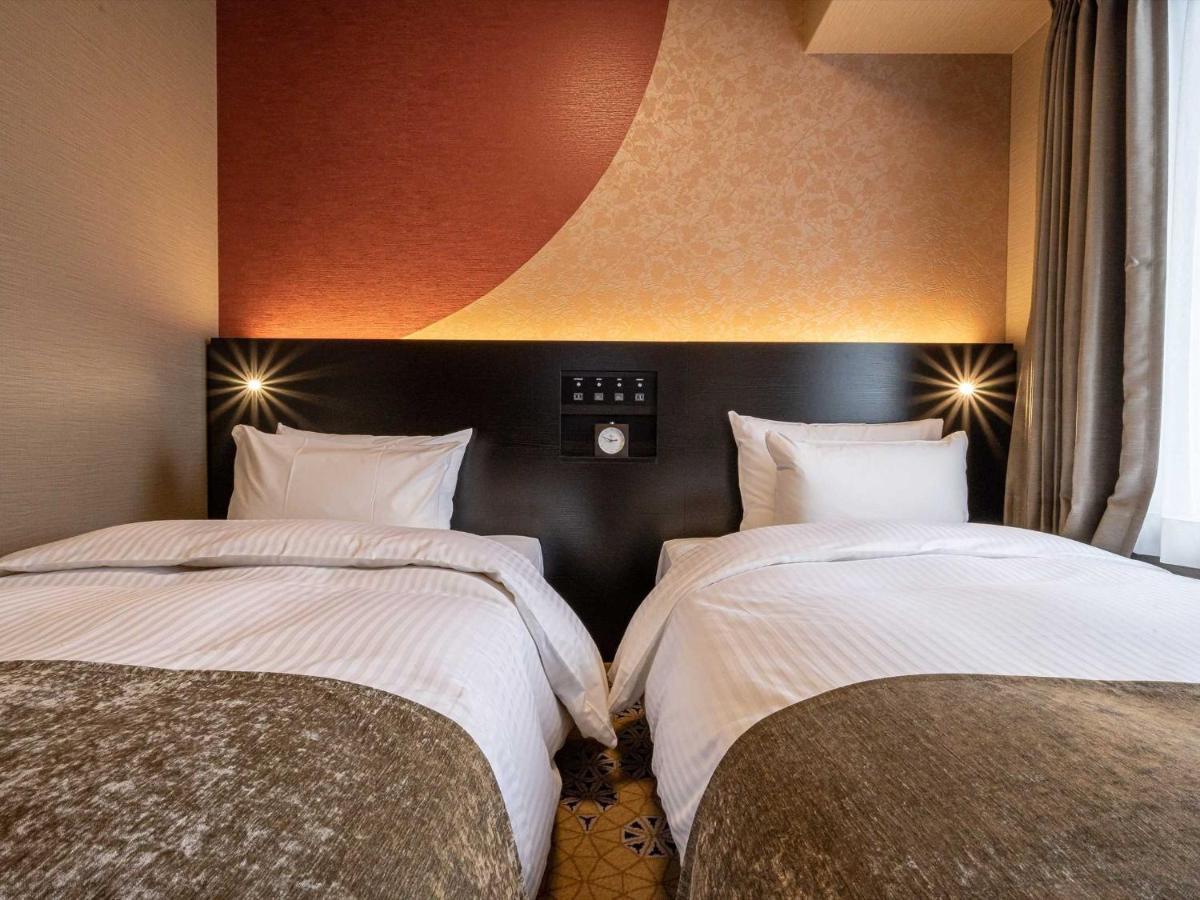 Hotel Wbf Shin-Osaka Skytower Bagian luar foto