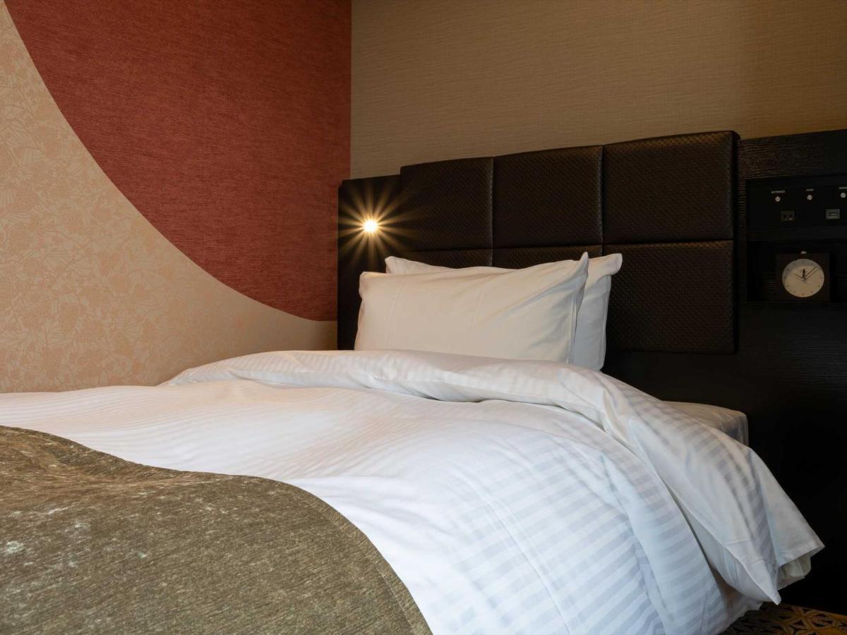 Hotel Wbf Shin-Osaka Skytower Bagian luar foto