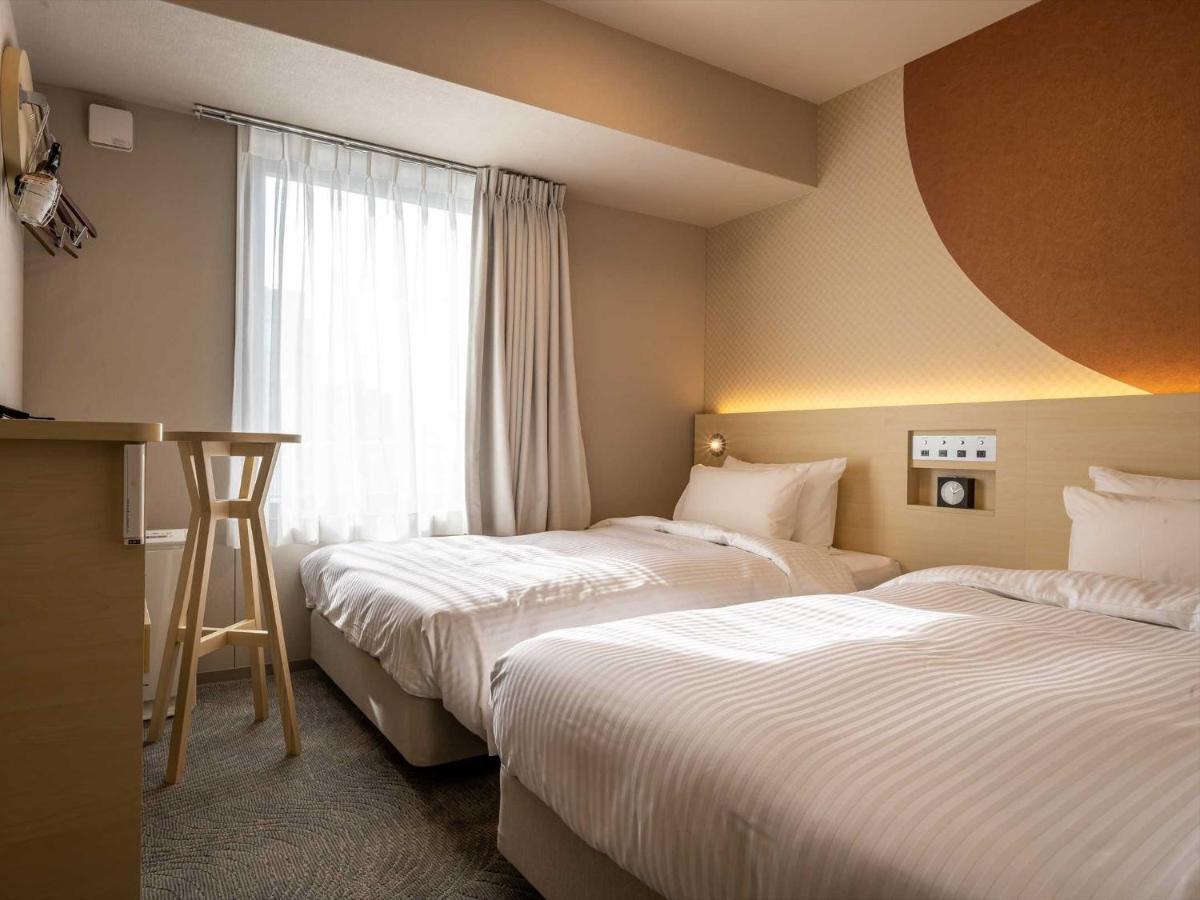Hotel Wbf Shin-Osaka Skytower Bagian luar foto